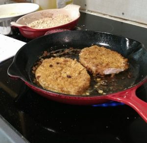 pork chops in fry pan